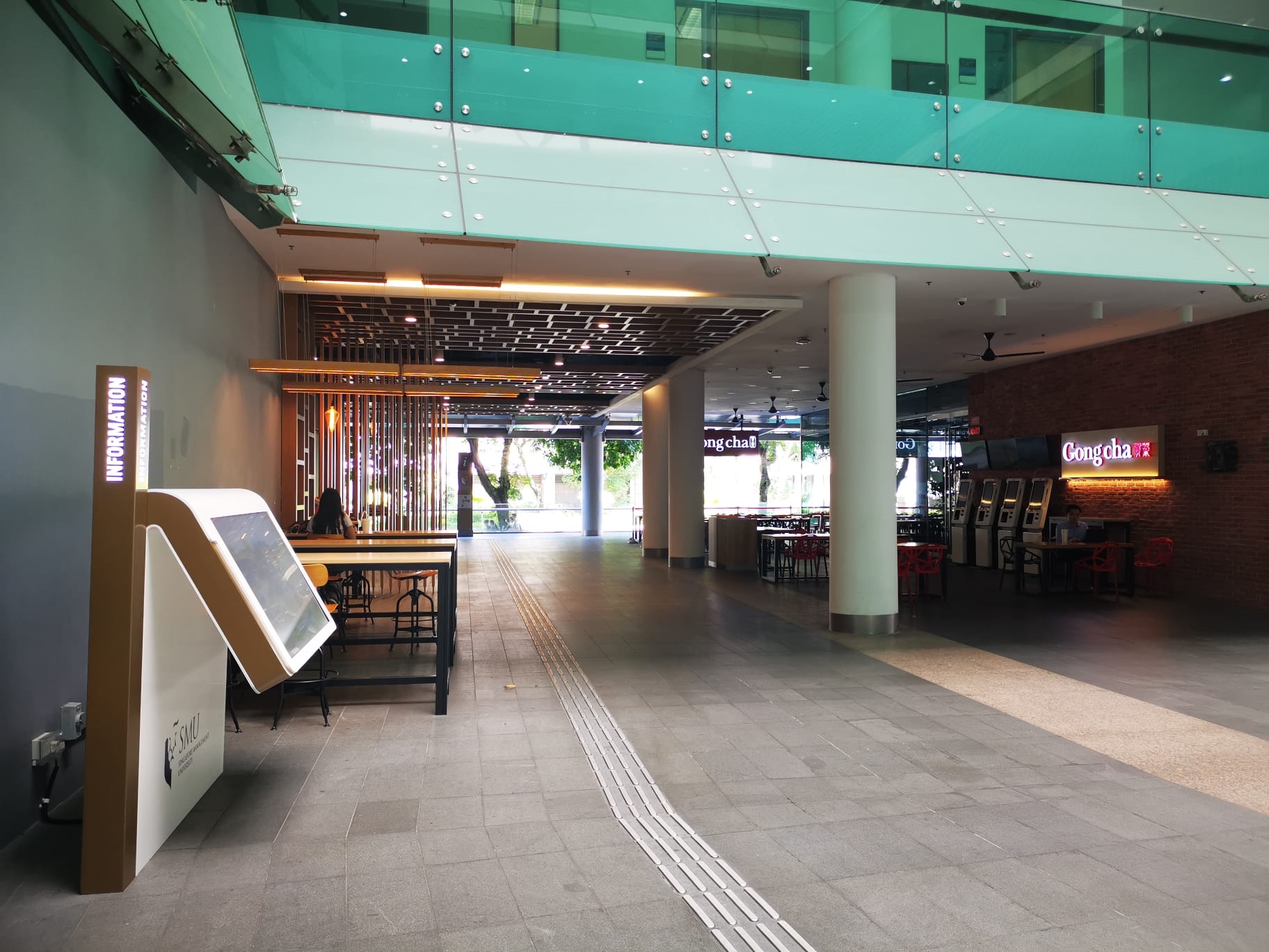 Located next to escalator leading to Lee Kong Chian School of Business and carpark 