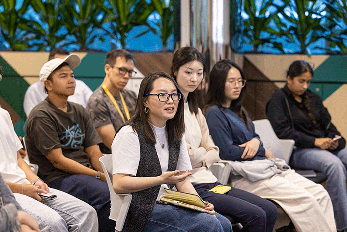 Participants seeking insights from the panelists